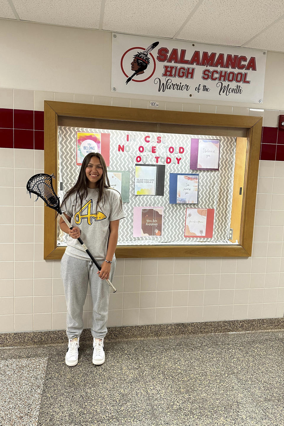 Student Marijah Skye, 17, poses at Salamanca High School in Salamanca, N.Y. on April 18, 2023. Marijah and other Native American students favor keeping the school's logo, which features the profile of a Native American man, despite the state's ban on the use of Indigenous names, mascots and logos by public schools. The school is located on Seneca Nation of Indians territory. (AP Photo/Carolyn Thompson)