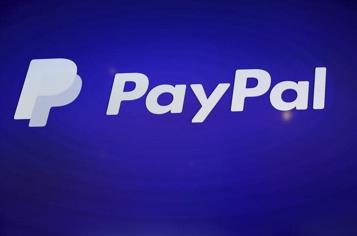 The PayPal logo is seen during an event at Terra Gallery in San Francisco, California May 21, 2015. REUTERS/Robert Galbraith/File Photo