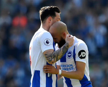 Soccer Football - Premier League - Brighton & Hove Albion v Manchester City - The American Express Community Stadium, Brighton, Britain - May 12, 2019 Brighton's Bruno Saltor hugs Lewis Dunk as he is substituted off REUTERS/Toby Melville