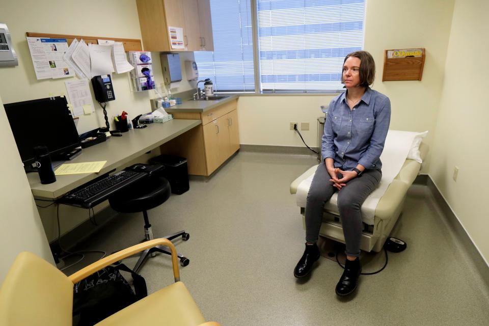 Jennifer Haller waits in an exam room to be the first given a shot in the Phase 1 trial of a coronavirus vaccine on March 16, 2020.