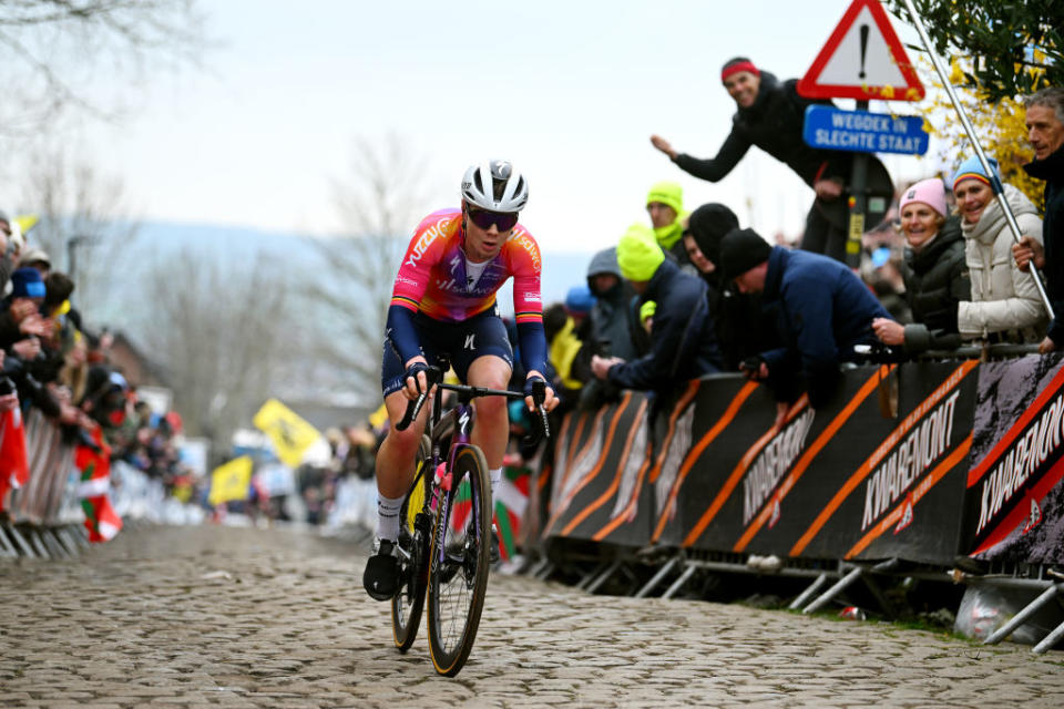 OUDENAARDE BELGIUM  APRIL 02 Lotte Kopecky of Belgium and Team SD Worx competes passing through a cobblestones sector during the 20th Ronde van Vlaanderen  Tour des Flandres 2023 Womens Elite a 1566km one day race from Oudenaarde to Oudenaarde  UCIWWT  on April 02 2023 in Oudenaarde Belgium Photo by Luc ClaessenGetty Images