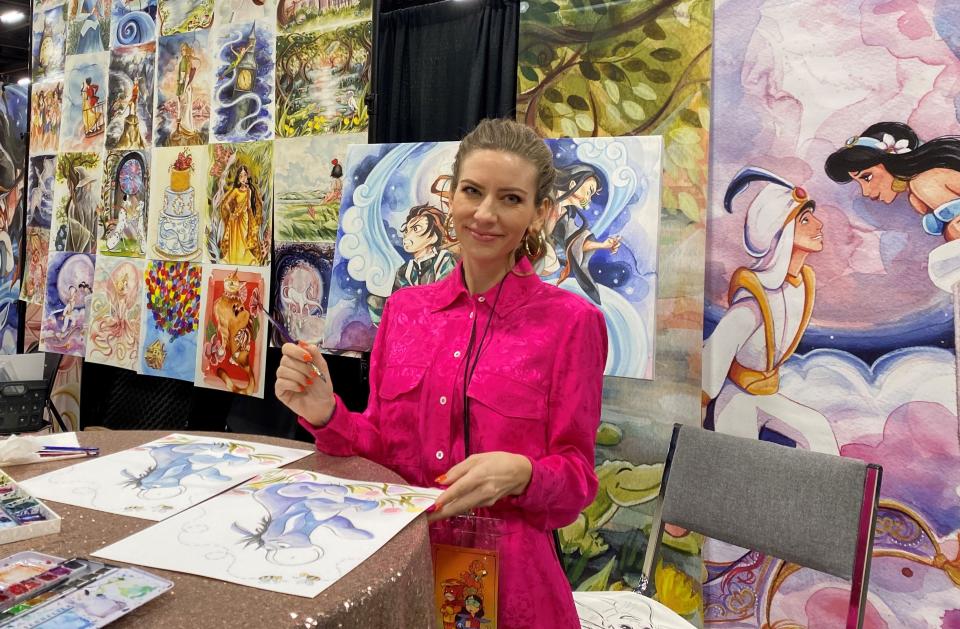 Megan Withey, an artist from West Palm Beach, Florida, sold paintings at Phoenix Fan Fusion on May 29, 2022.