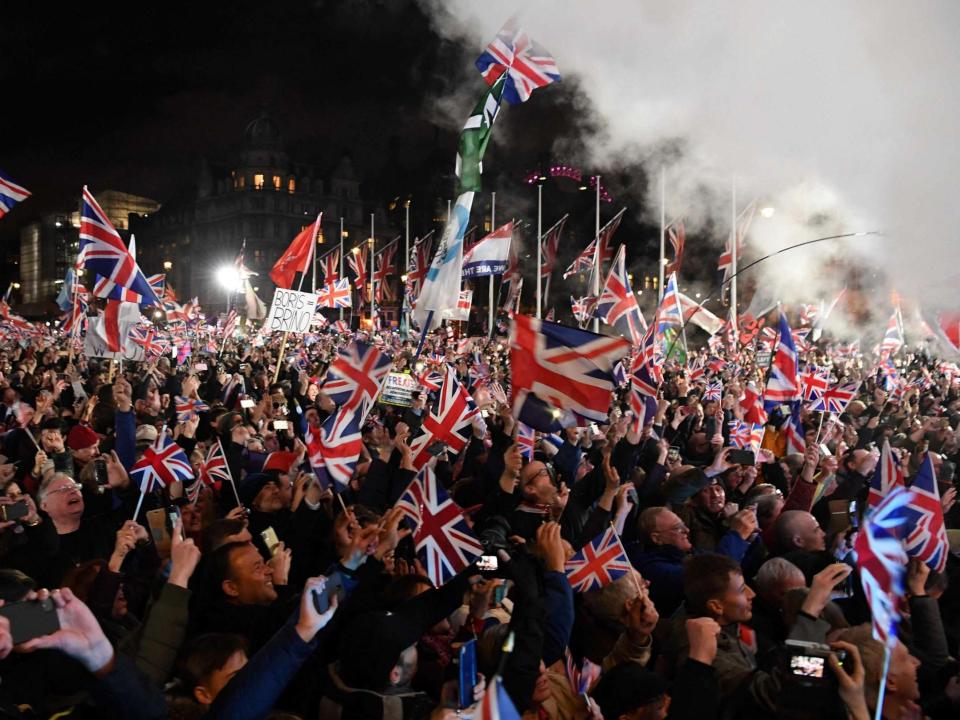 Brexit supporters celebrate as the clock reaches 11pm in Parliament Square, London, 31 January, 2020: Daniel Leal-Olivas/AFP via Getty Images