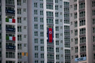 <p>A large North Korean flag hangs from an apartment building at the Olympic Village prior to the 2018 Winter Olympics in Gangneung, South Korea, Friday, Feb. 2, 2018. (AP) </p>