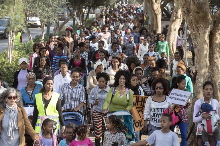 Several hundred African women asylum seekers and their children, who entered Israel illegally via Egypt, stage a protest in Tel Aviv, on January 15, 2014