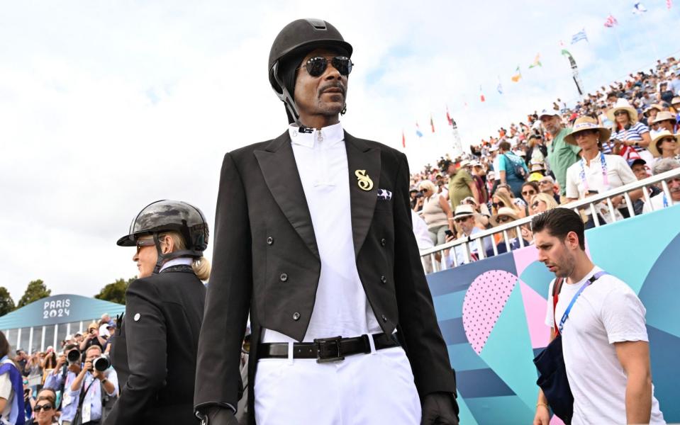 Snoop Dogg during the team dressage final at the Palace of Versailles/