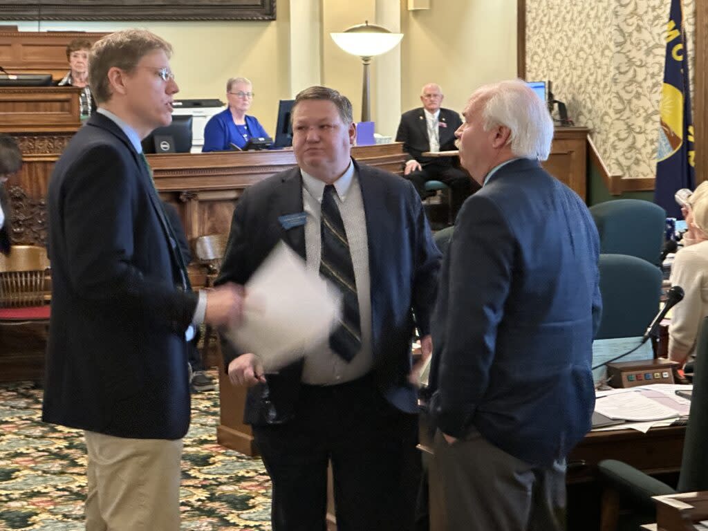 Majority Leader Steve Fitzpatrick, R-Great Falls, Senate President Jason Ellsworth, R-Hamilton, and Minority Leader Pat Flowers, D-Belgrade, finish hashing out a debate over Senate rules on Senate Bill 99 on Feb. 7, 2023.