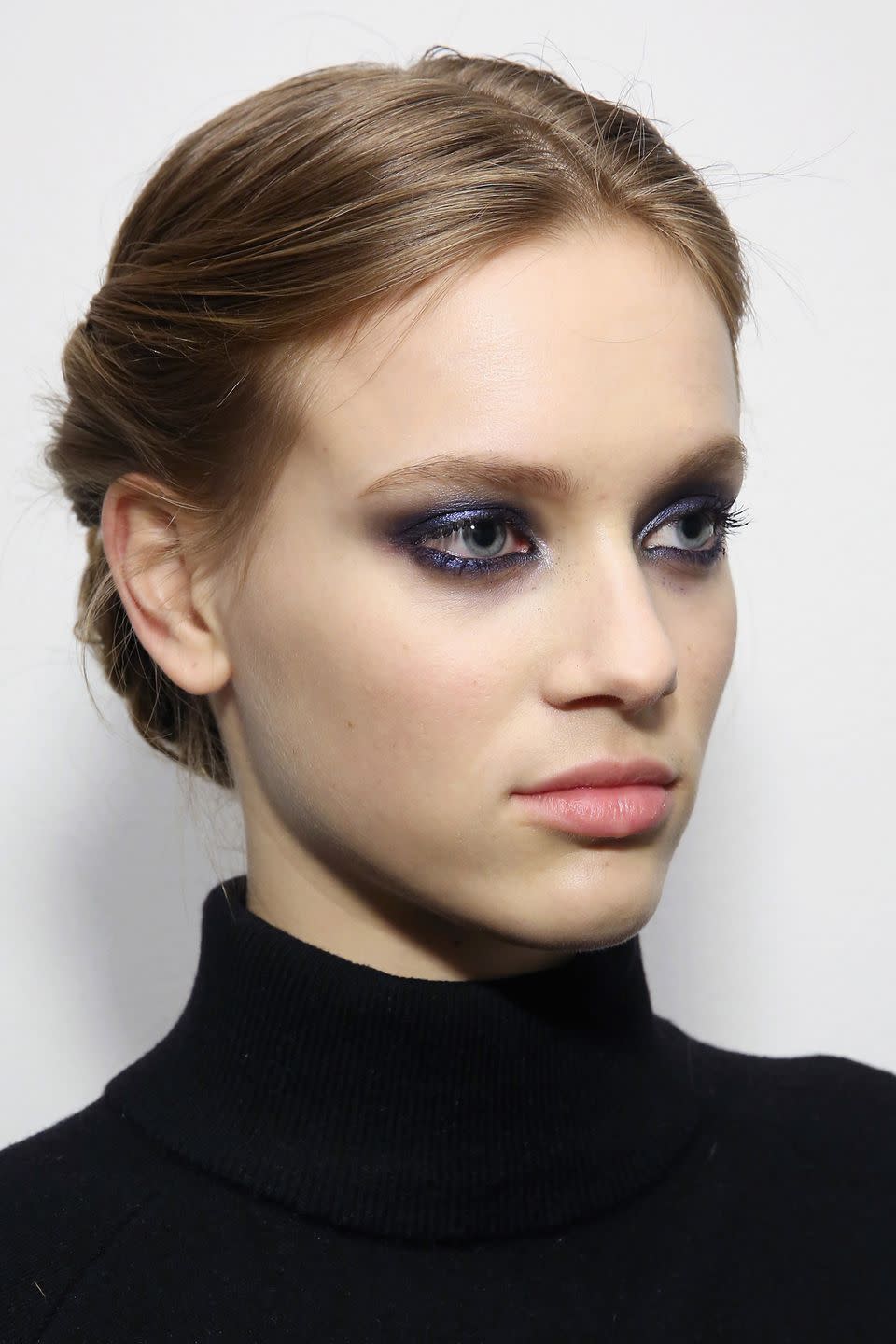 <p><strong>Trend: purple glitter eyes </strong></p><p>The make-up at Carolina Herrera was a new and playful take on the smoky eye, which lead make-up artist Diane Kendal dubbed the "midnight smoky." Mac's <a rel="nofollow noopener" href="https://www.maccosmetics.co.uk/product/13840/372/products/makeup/eyes/eyeshadow/pigment#/shade/Deep_Blue_Green" target="_blank" data-ylk="slk:Pigment in Naval Blue;elm:context_link;itc:0;sec:content-canvas" class="link ">Pigment in Naval Blue</a> £16.50, was diffused over the eyelids and <a rel="nofollow noopener" href="https://www.maccosmetics.co.uk/product/13838/40607/products/makeup/eyes/eye-liner/modern-twist-kajal-liner" target="_blank" data-ylk="slk:Modern Twist Kajal Liner in Ocean Liner;elm:context_link;itc:0;sec:content-canvas" class="link ">Modern Twist Kajal Liner in Ocean Liner</a>, £15, over both lash lines. It was teamed with a touch of <a rel="nofollow noopener" href="https://www.maccosmetics.co.uk/product/13839/10182/products/makeup/eyes/mascara/haute-naughty-lash-mascara" target="_blank" data-ylk="slk:Haute & Naughty Lash Mascara;elm:context_link;itc:0;sec:content-canvas" class="link ">Haute & Naughty Lash Mascara</a> £20, and <a rel="nofollow noopener" href="https://www.maccosmetics.co.uk/product/13840/372/products/makeup/eyes/eyeshadow/pigment#/shade/Platinum" target="_blank" data-ylk="slk:Pigment in Platinum;elm:context_link;itc:0;sec:content-canvas" class="link ">Pigment in Platinum</a>, £16.50, on the tear ducts for further definition.</p>