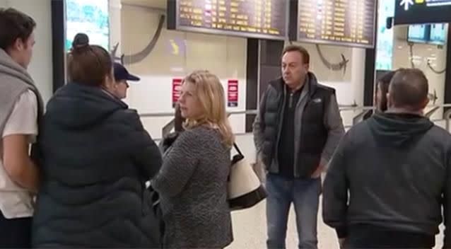 Pictured: Distraught families wait at the airport for information. Photo: 7 News