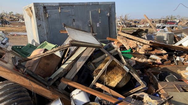 PHOTO: Debris from a tornado covers the ground from Chuck's dairy bar diner, March 25, 2023 in Rolling Fork, Miss. (Rogelio Solis/AP)