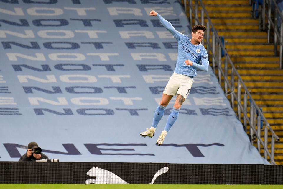 John Stones netted a brace, the first goal marking his first in the league for CityPOOL/AFP via Getty Images