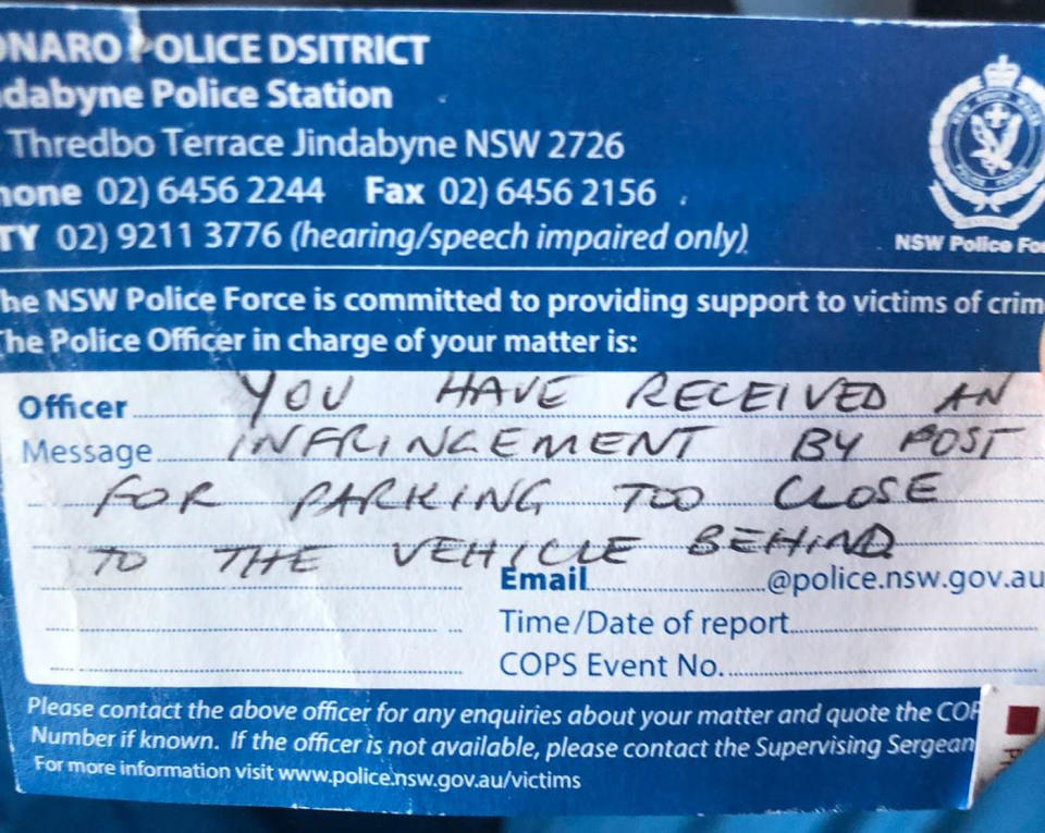 A Reddit user claims their friend received this note outside a police station in Jindabyne, NSW for parking too close to another car but others have pointed out issues with the note. Source: Reddit/ Steveeeeyh