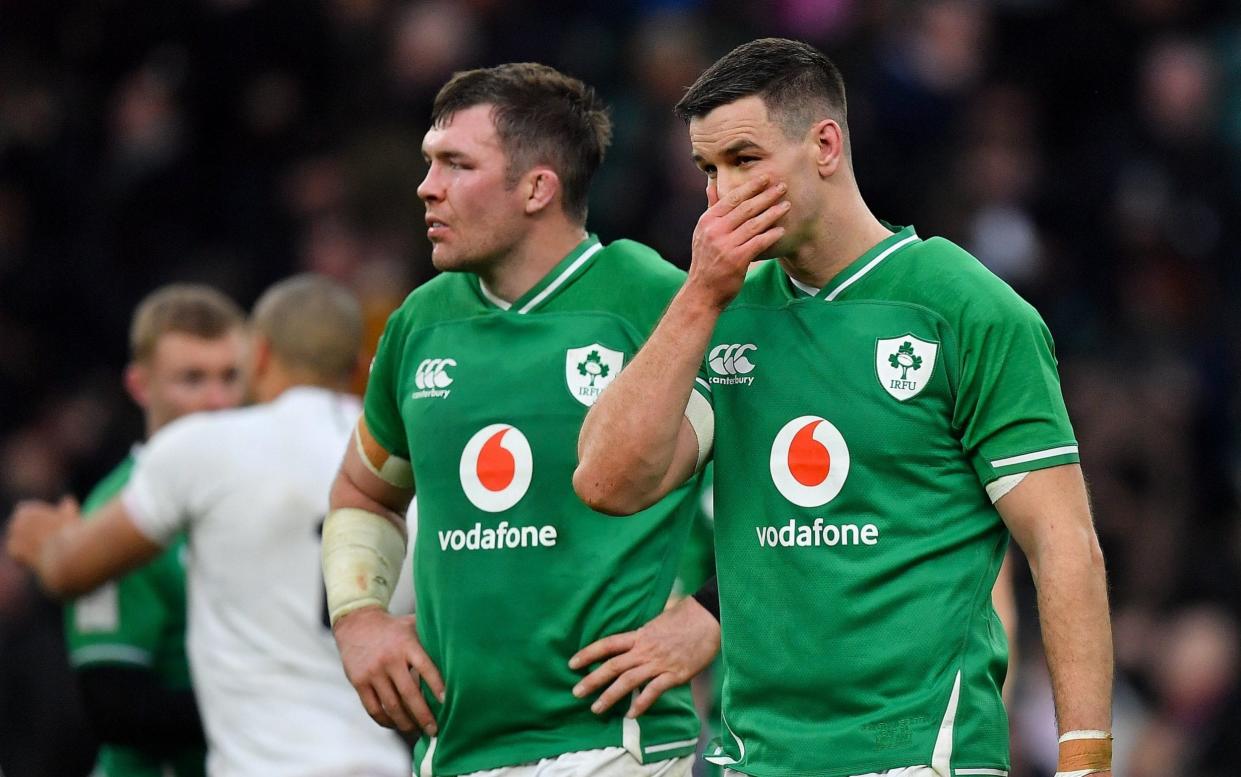 Peter O'Mahony, left, and Jonathan Sexton of Ireland after the Guinness Six Nations Rugby Championship match between England and Ireland - SPORTSFILE