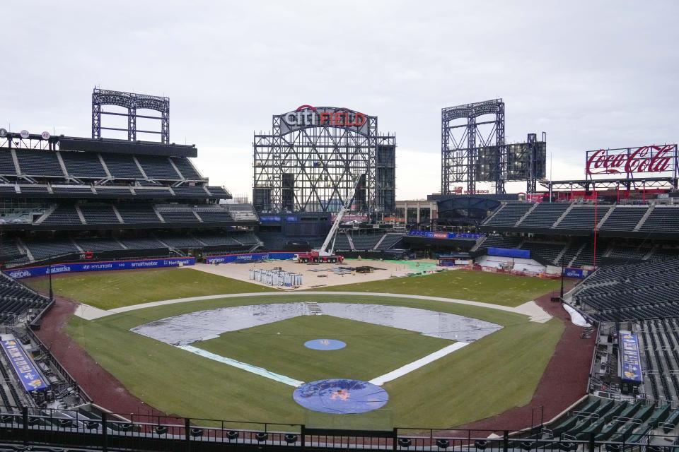 Citi Field under construction is seen during the off season, Tuesday, Jan. 31, 2023, in New York. The Mets are moving in the Citi Field fence for the third time, reducing right-center by 8 1/2 feet to create additional fan gathering space. The team brought in the wall by as much as 12 feet after 2011 and lowered the fence height from 16 to 8 feet in left, then brought in fences by 3 to 11 feet in front of the bullpens in right field ahead of 2015. (AP Photo/Mary Altaffer)