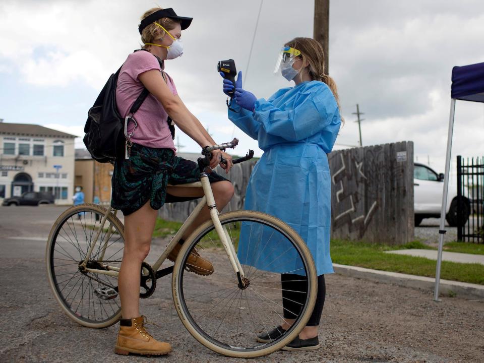 coronavirus test testing drive-thru temperature bike