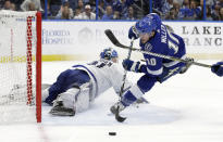 Tampa Bay Lightning center J.T. Miller (10) loses control of the puck as he goes in for a shot on Toronto Maple Leafs goaltender Frederik Andersen (31) during the second period of an NHL hockey game Thursday, Dec. 13, 2018, in Tampa, Fla. (AP Photo/Chris O'Meara)