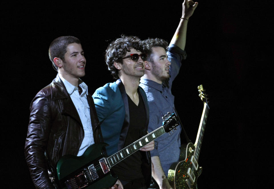 The Jonas Brothers, from left to right Nick, Joe and Kevin, perform at the Vina del Mar International Song Festival in Vina del Mar, Chile, Tuesday, Feb. 26, 2013. Believed to be one of the largest musical events in Latin America, the annual 5-day festival was inaugurated in 1960. (AP Photo/Luis Hidalgo)