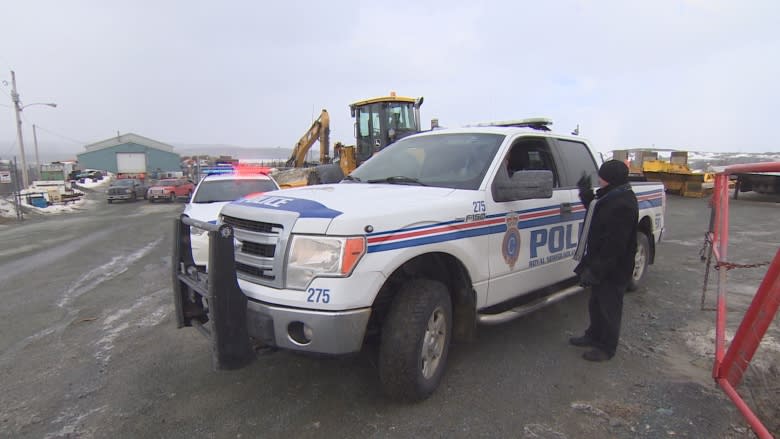 Police, medical examiner working to ID body found in St. John's gravel pit