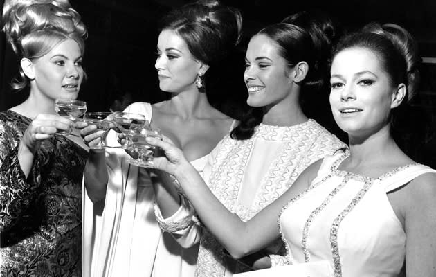 <b>Thunderball – 1965</b><br><br> Mollie Peters, Claudine Auger, Martine Beswick and Luciana Paluzzi enjoy drinks at the ‘Thunderball’ film premiere in 1965. <br><br> (Copyright: REX)