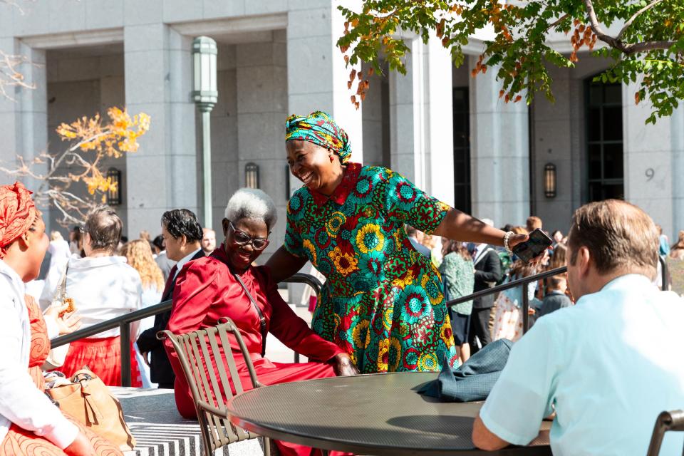 Right to left, Blessing Wachukwu dances next to her mother Godgift Opah in between the Sunday morning and Sunday afternoon sessions of the 193rd Semiannual General Conference of The Church of Jesus Christ of Latter-day Saints at the Conference Center in Salt Lake City on Sunday, Oct. 1, 2023. | Megan Nielsen, Deseret News