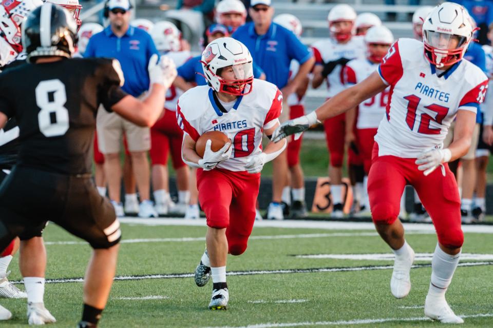 Garaway's Dillon Soehnlen runs the ball during the game against Carrollton, Friday, Sept. 8 at Warrior Stadium in Carrollton.