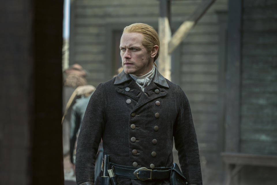 This image released by Starz shows Sam Heughan in a scene from the series "Outlander." (Robert Wilson/Starz via AP)