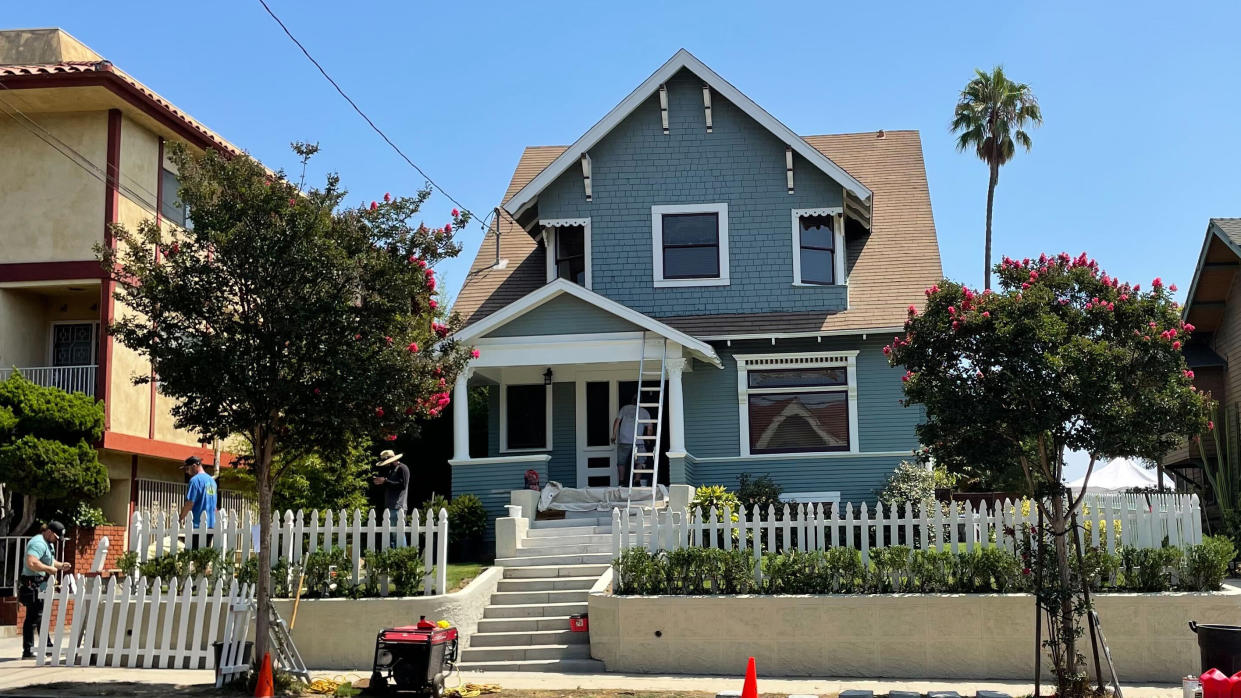 Workers prep the “Fast and Furious” Toretto family house for shooting. - Credit: Variety