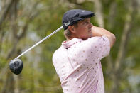 Bryson DeChambeau hits a shot from the third tee during the third round of the Arnold Palmer Invitational golf tournament Saturday, March 6, 2021, in Orlando, Fla. (AP Photo/John Raoux)