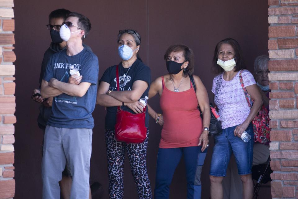 People wait in line to enter the casino on May 15, 2020, at Fort McDowell Casino near Fountain Hills.