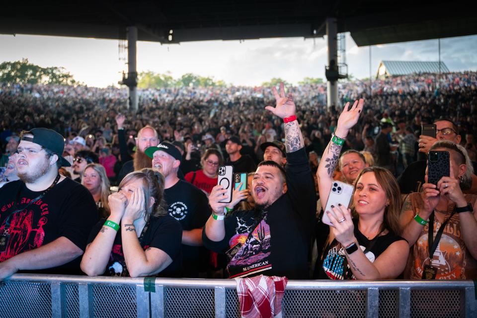 Fans cheer before Jelly Roll takes the stage at Pine Knob Music Theatre in Clarkston on Thursday, Aug. 17, 2023.