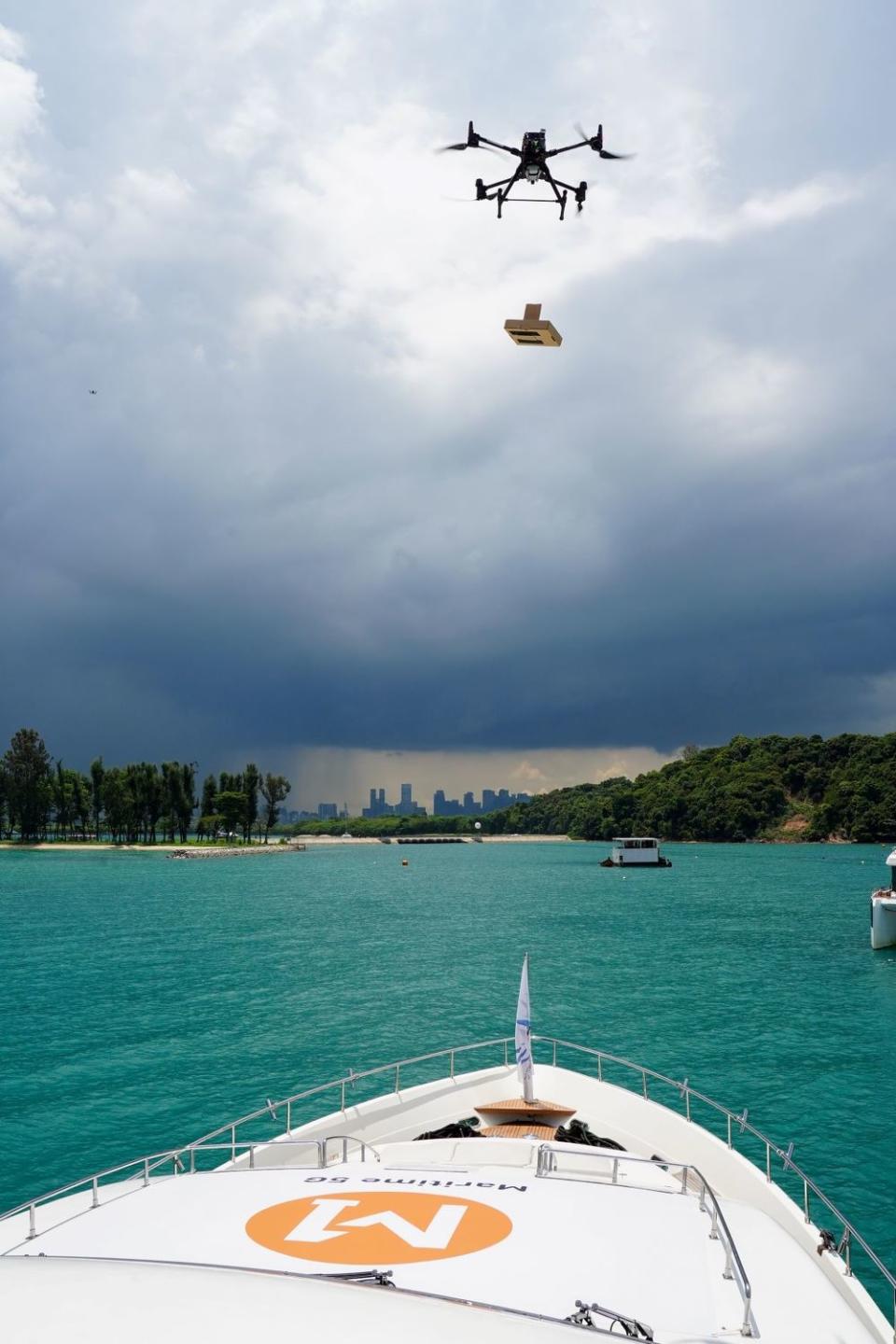 5G-enabled drone dropping off the medicine package onto the vessel 