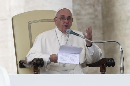 Pope Francis speaks as he leads the weekly audience in Saint Peter's square at the Vatican, October 14, 2015. REUTERS/Stefano Rellandini