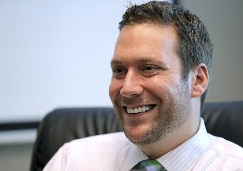 FILE - In this Sept. 30, 2019, file photo, Seminole County Tax Collector Joel Greenberg talks to the Orlando Sentinel during an interview at his office in Lake Mary, Fla. A former Florida tax collector whose arrest on sex trafficking and identity theft charges led to a probe of U.S. Rep. Matt Gaetz should not be granted a sentence that is less than federal guidelines in order to promote respect for the law and deter criminal behavior, federal prosecutors said in court papers. (Joe Burbank/Orlando Sentinel via AP, File)