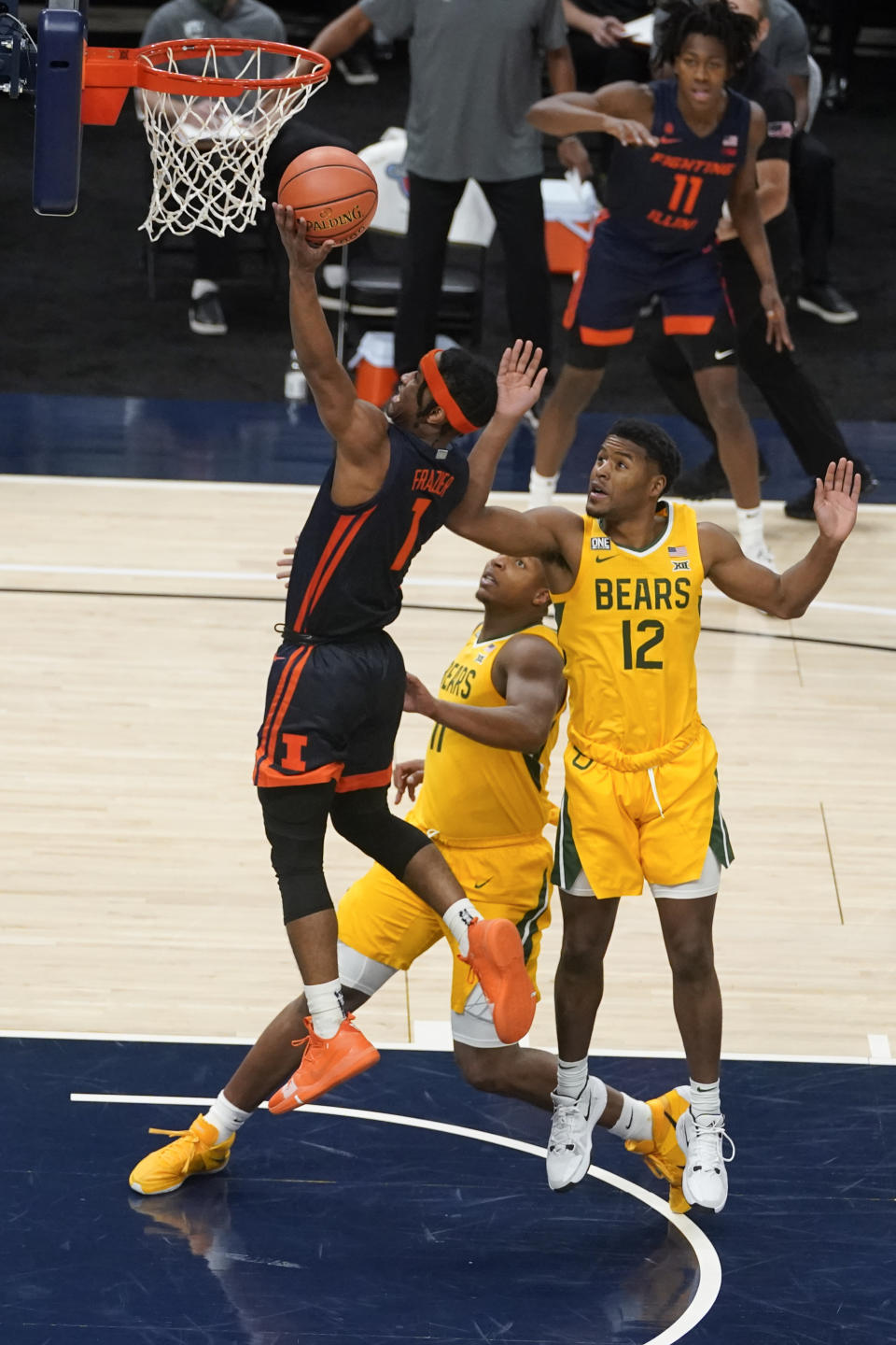 Illinois' Trent Frazier (1) puts up a shot against Baylor's Jared Butler (12) and Mark Vital (11) during the first half of an NCAA college basketball game, Wednesday, Dec. 2, 2020, in Indianapolis. (AP Photo/Darron Cummings)