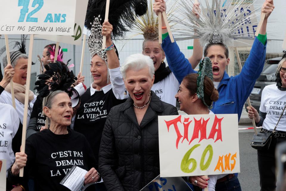 Former model Maye Musk, mother of business magnate Elon Musk poses with militants of the association “Don’t be old be bold” demonstrating outside the Christian Dior Spring-Summer 2023 fashion show during the Paris Womenswear Fashion Week, in Paris, on September 27, 2022. - Credit: AFP via Getty Images