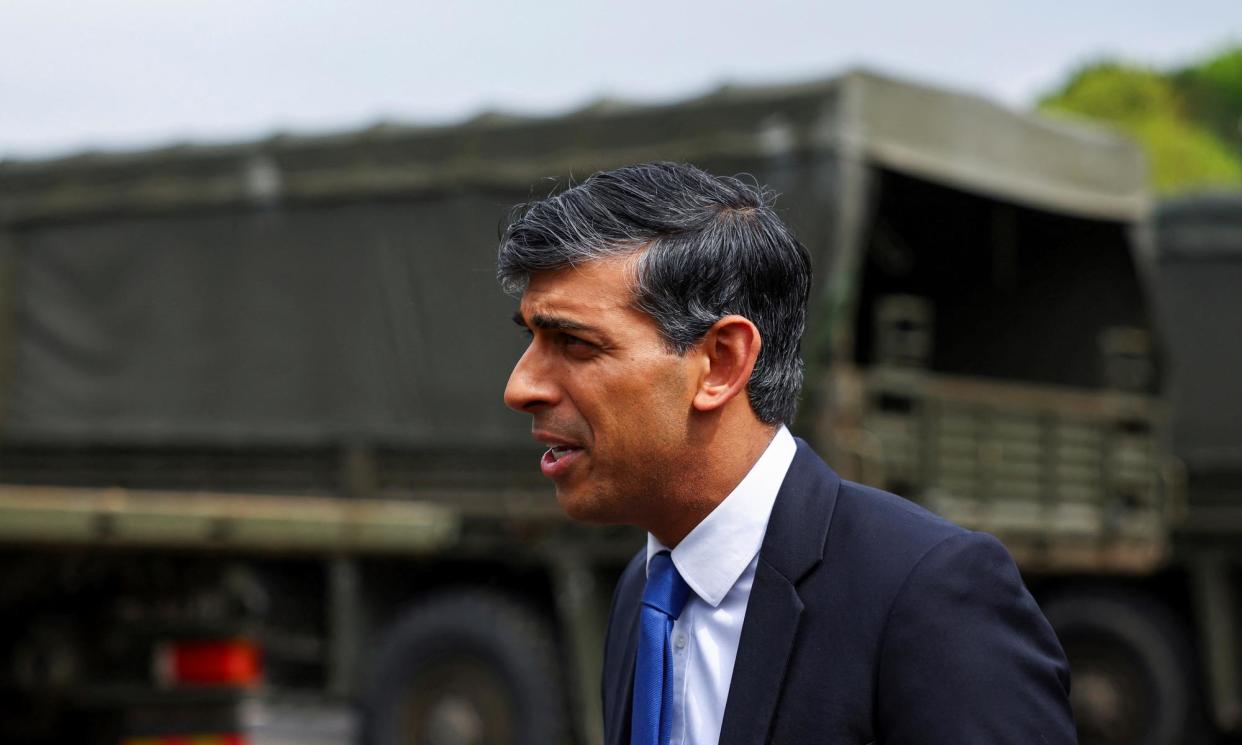 <span>Rishi Sunak on a visit to the Catterick Garrison in North Yorkshire on 3 May. His allies insist his plan is working despite criticism from the right of the party.</span><span>Photograph: Molly Darlington/AP</span>