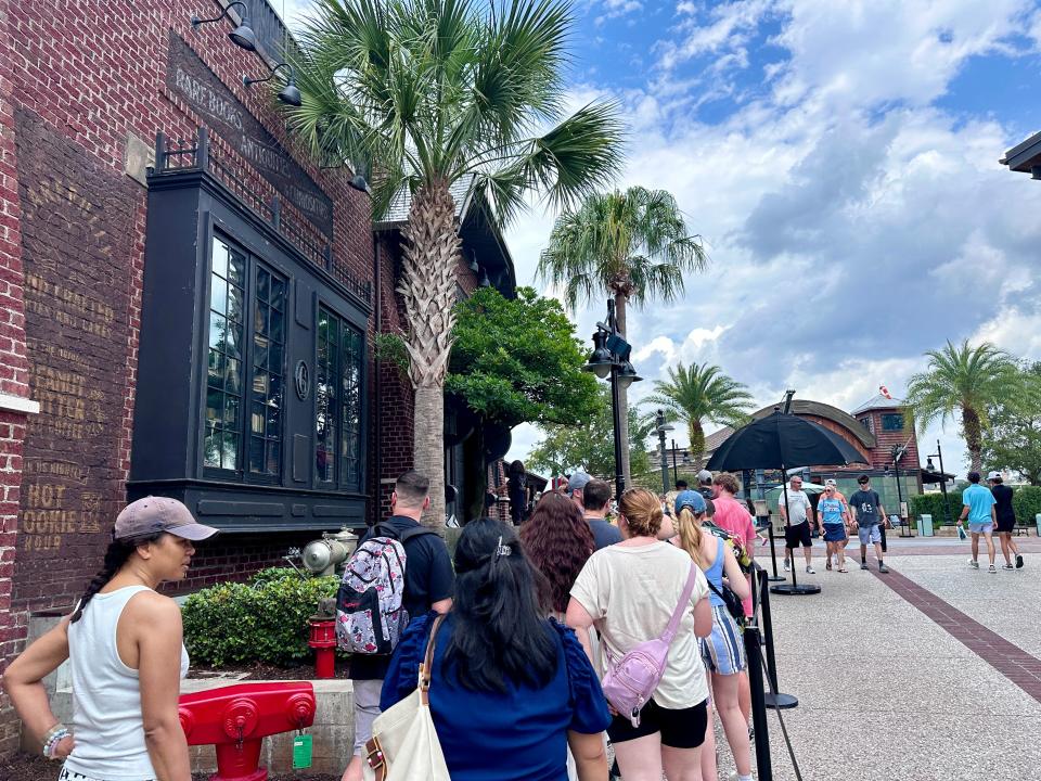 line of people outside gideon's bakehouse at disney springs