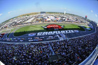 Drivers take the free flag for the start of a NASCAR Cup Series auto race at Charlotte Motor Speedway in Concord, N.C., Sunday, May 26, 2019. (AP Photo/Mike McCarn)