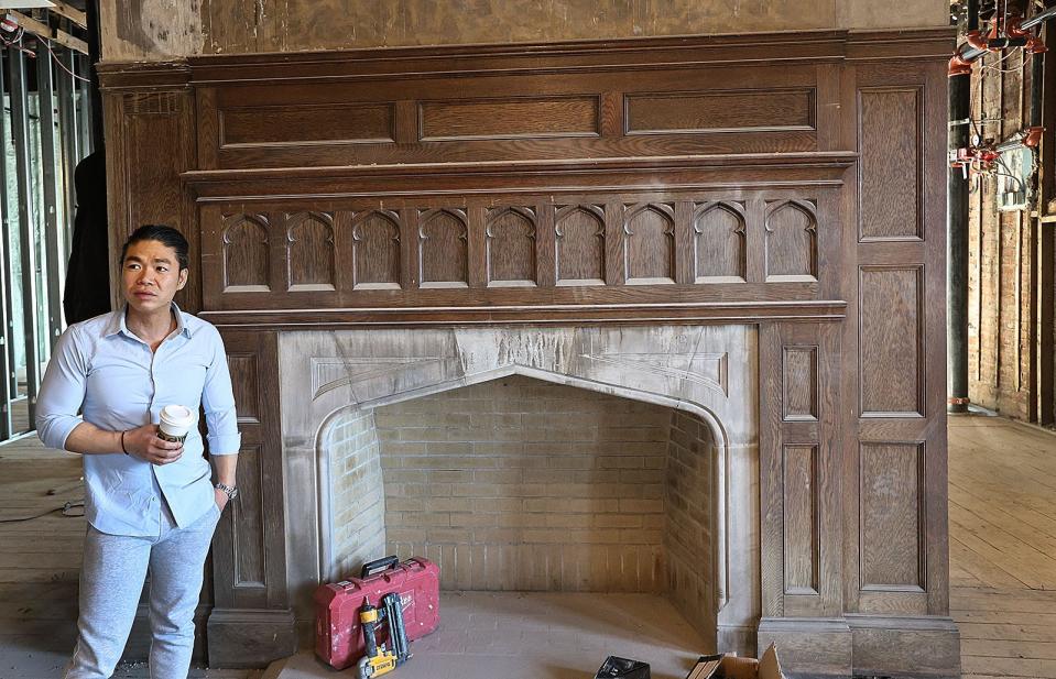 The Tudor-style fireplace will be preserved.