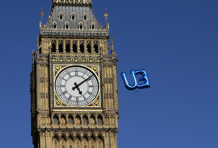 A balloon floats towards the Big Ben clock tower in Parliament Square during a 'March for Europe' demonstration against Britain's decision to leave the European Union, in central London, Britain, July 2, 2016. REUTERS/Kevin Coombs