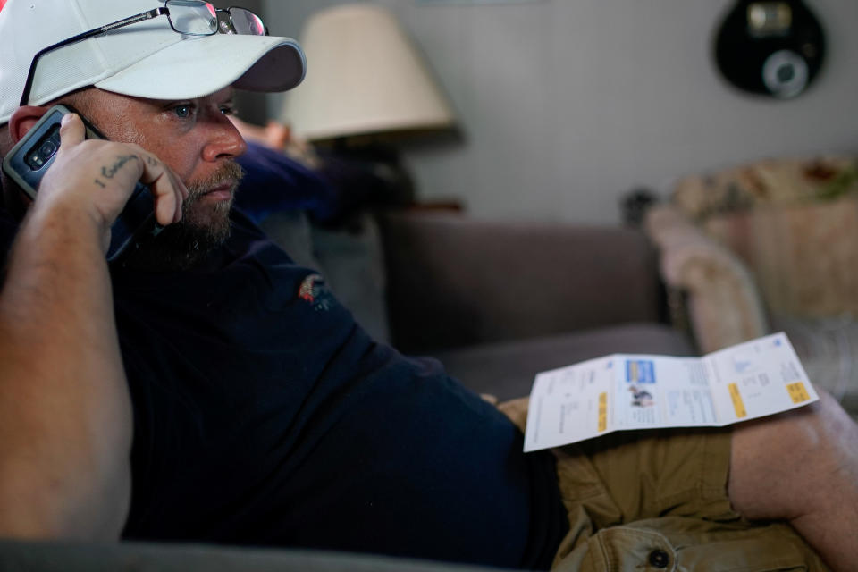 Frank Lee, a striking UAW auto worker from the General Motors assembly plant in Bowling Green, calls a bill collector from his home in Auburn, Kentucky, U.S., October 1, 2019. Picture taken  October 1, 2019. REUTERS/Bryan Woolston