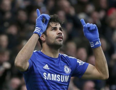 Chelsea's Diego Costa celebrates after scoring a goal against West Ham United during their English Premier League soccer match at Stamford Bridge in London, December 26, 2014. REUTERS/Stefan Wermuth
