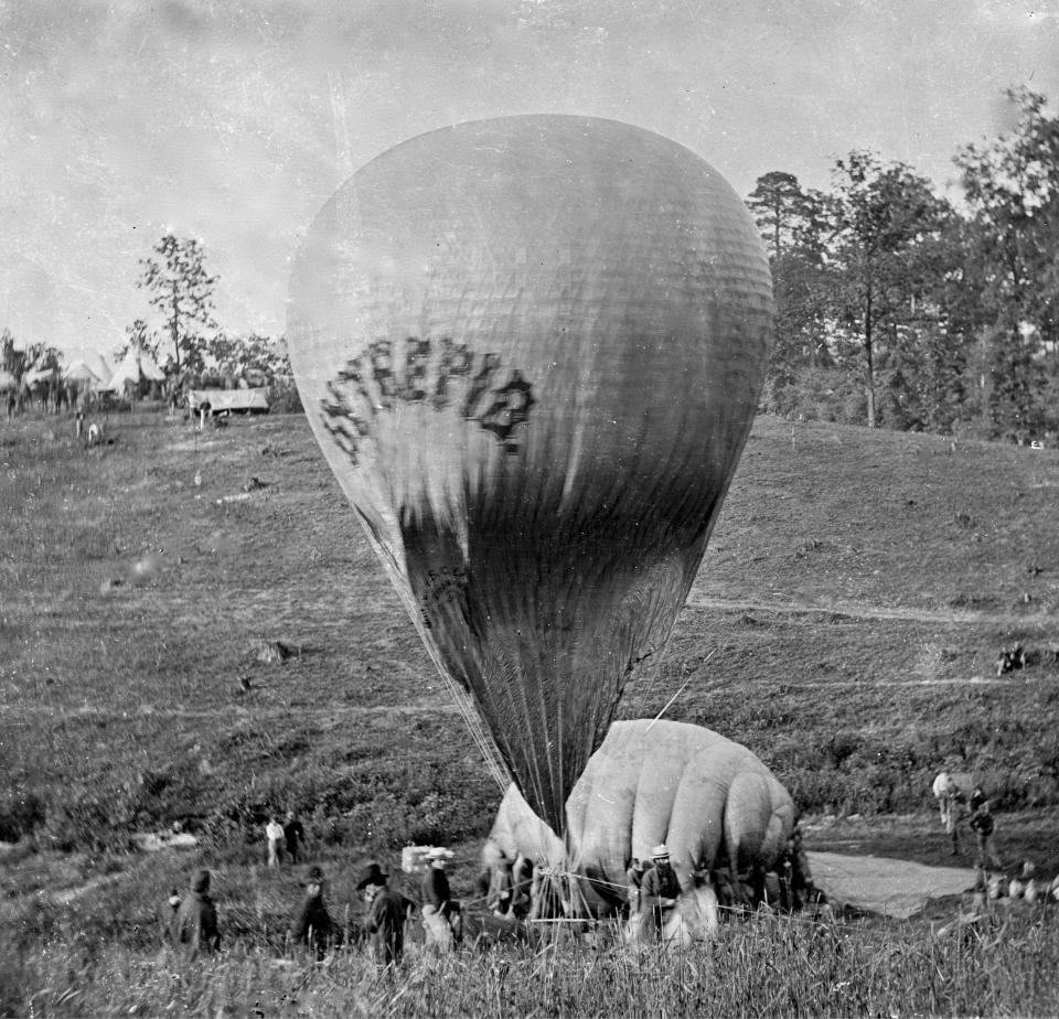 A balloon is inflated before being used to watch over a battle known as the Battle of Fair Oaks in 1862.