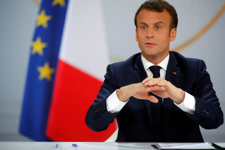 French President Emmanuel Macron speaks during a news conference to unveil his policy response to the yellow vests protest, at the Elysee Palace in Paris, France, April 25, 2019. REUTERS/Philippe Wojazer