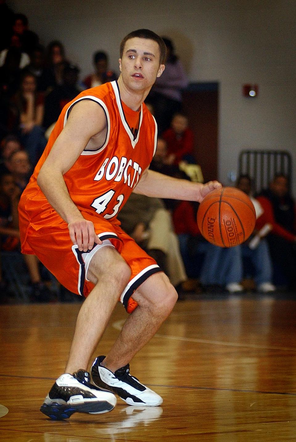 Northeastern's Levi Winters dribbles down the floor during his playing career on the Bobcats' basketball team.