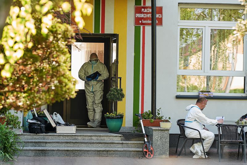 Police inspect the scene where a knife attack took place at a care and educational facility in the province Lodzkie