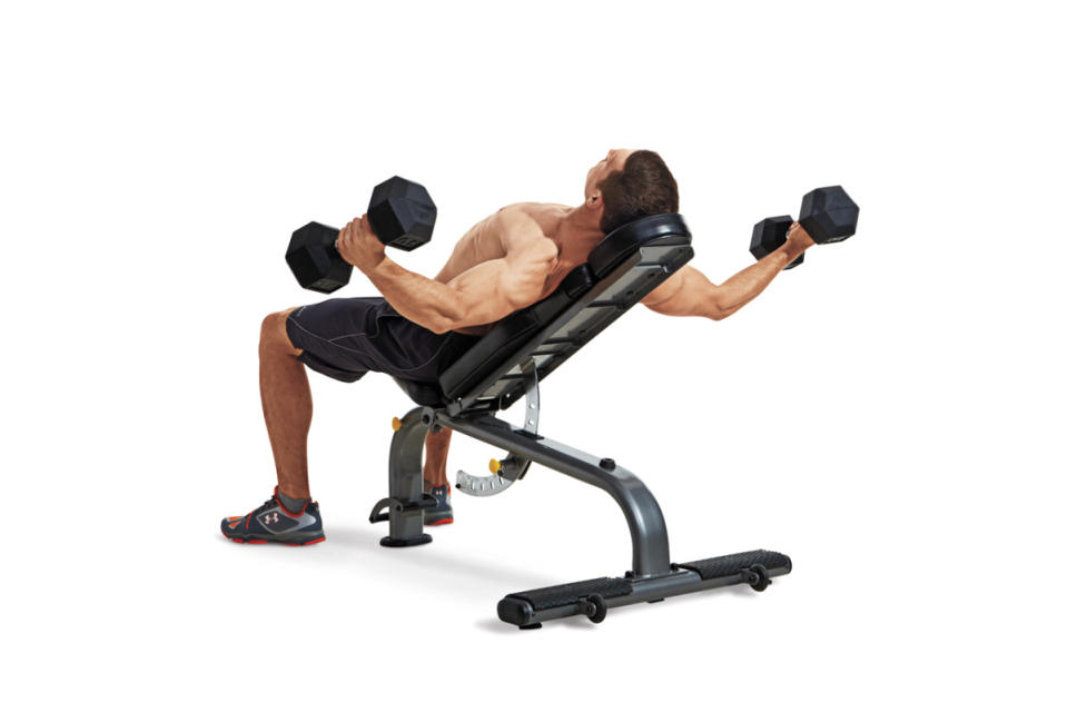 How to do it:<ol><li>Set an adjustable bench to a 30°-45° angle, and lie back on it with a dumbbell in each hand.</li><li>Turn your wrists so your palms face each other.</li><li>Press the weights straight over your chest, then, keeping a slight bend in your elbows, spread your arms open as if you were going for a big bear hug.</li><li>Lower your arms until you feel a stretch in your pecs, then bring the weights back together over your chest.</li></ol>