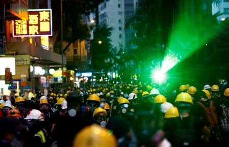 FILE PHOTO: Anti-extradition bill protesters attend a demonstration in Hennessy Road in Wan Chai neighbourhood in Hong Kong