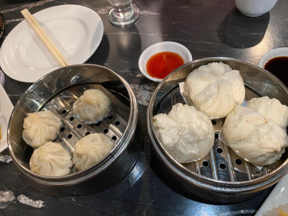 Steamed Shanghai dumplings and steamed BBQ pork buns at Empire Dim Sum in Oklahoma City.