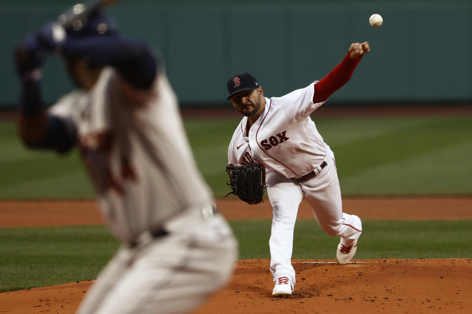 Boston Red Sox starting pitcher Martin Perez delivers against the Houston Astros during the first inning of a baseball game Tuesday, June 8, 2021, at Fenway Park in Boston. (AP Photo/Winslow Townson)